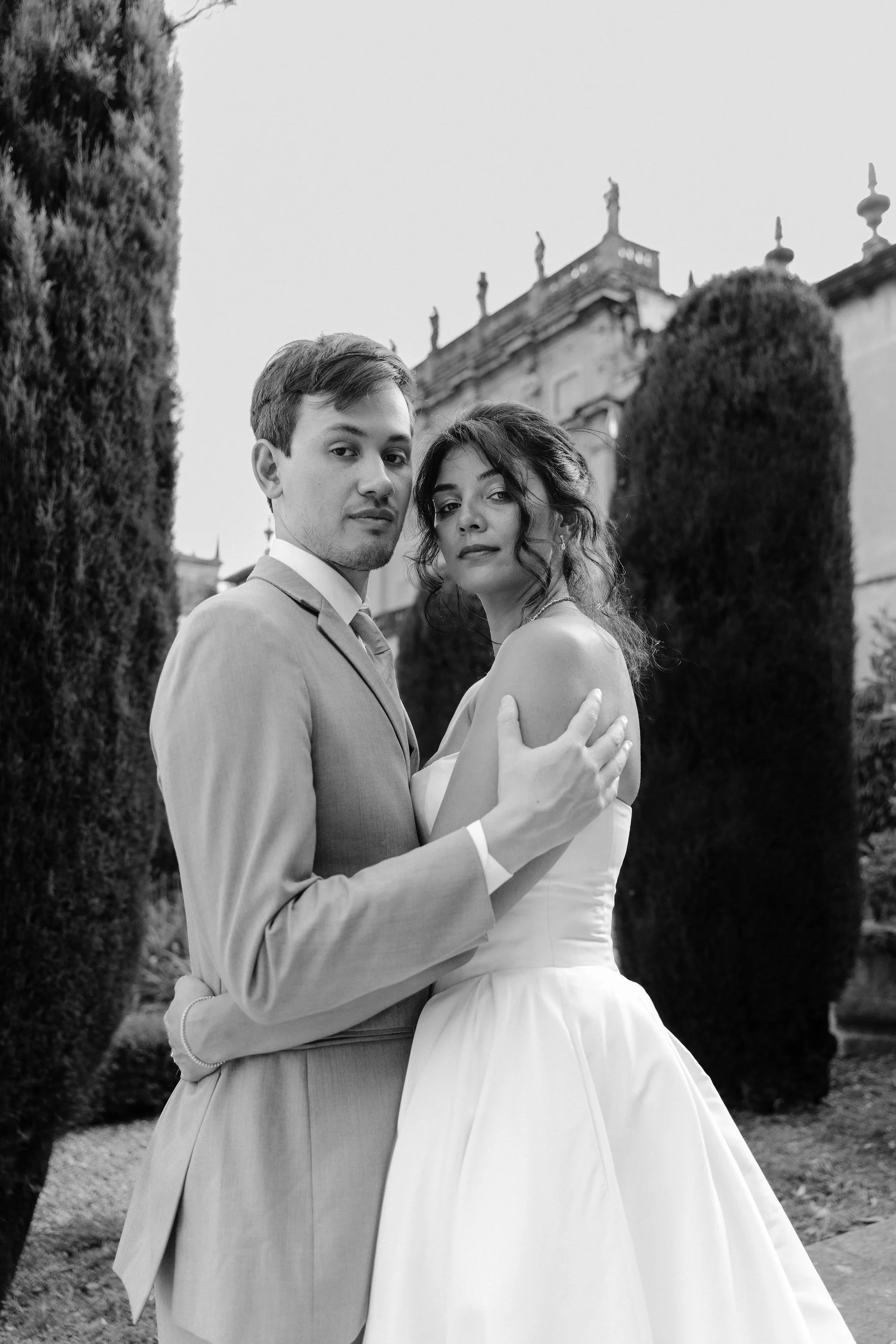 Black-and-white close portrait of the bride and groom