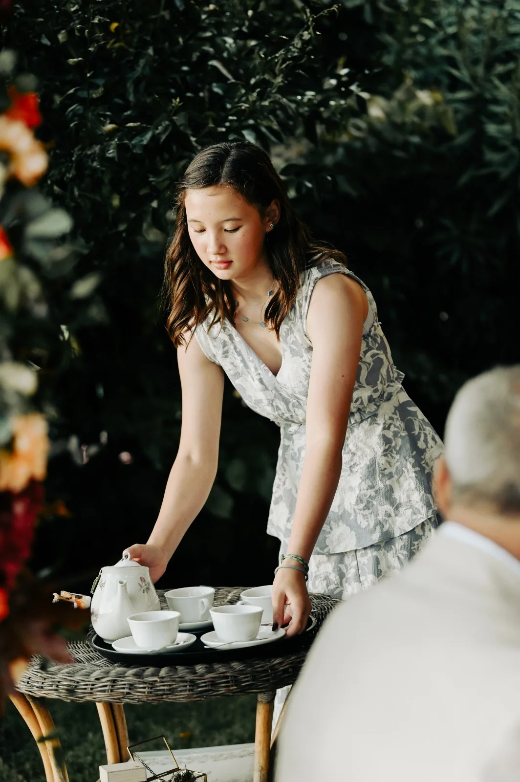 Bride cutting a wedding cake