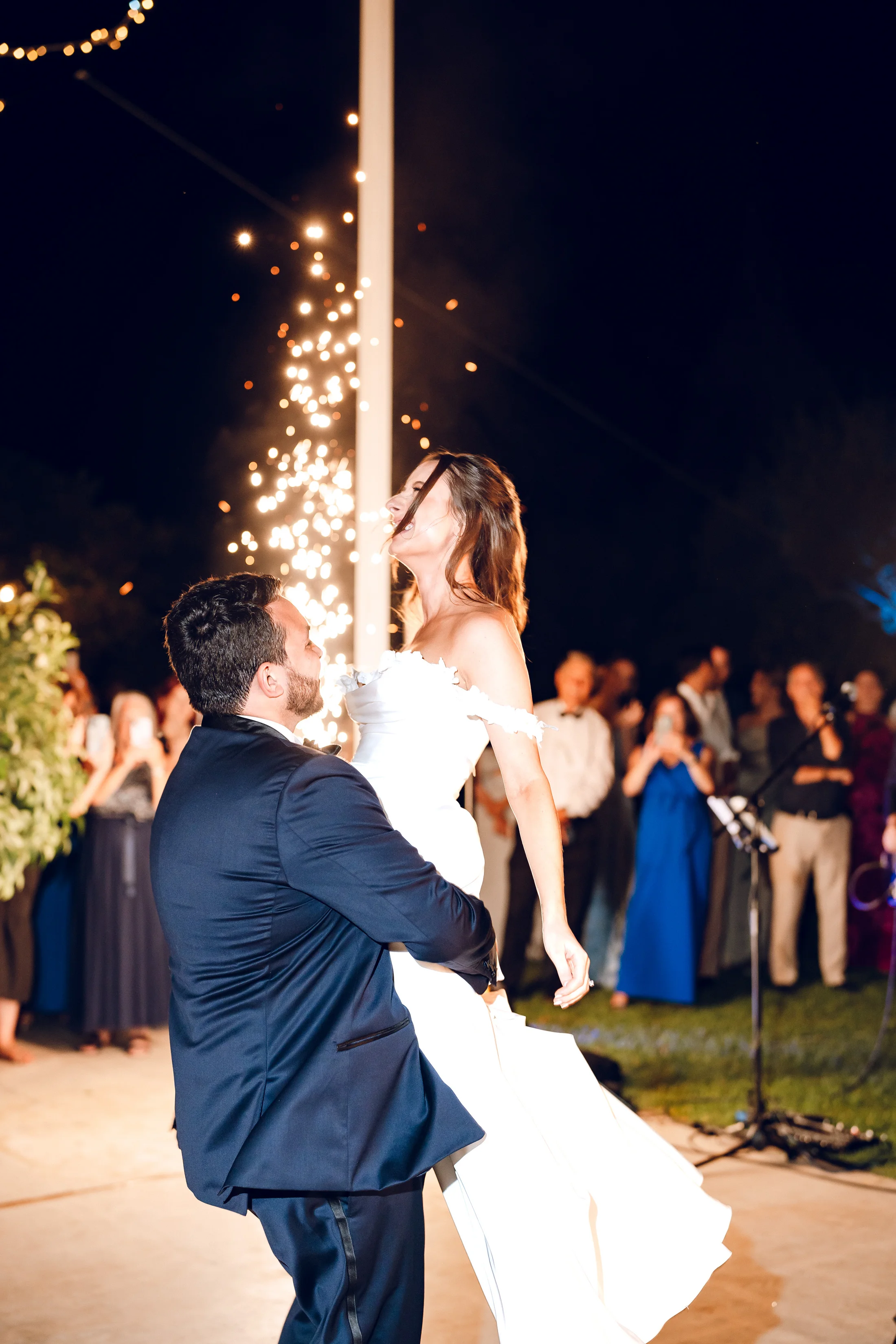 Bride and groom celebrating with sparklers