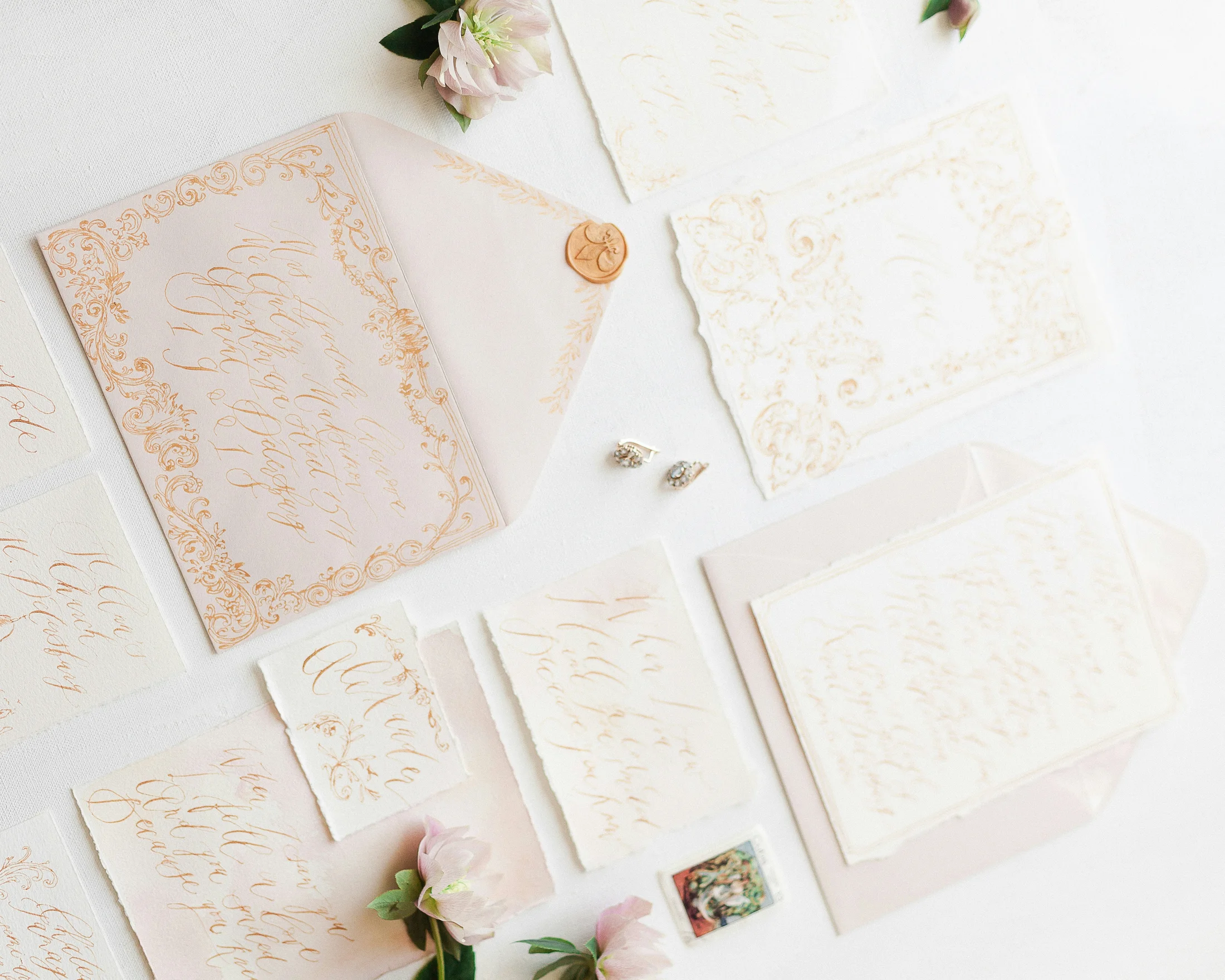 Wedding stationery and pale flowers