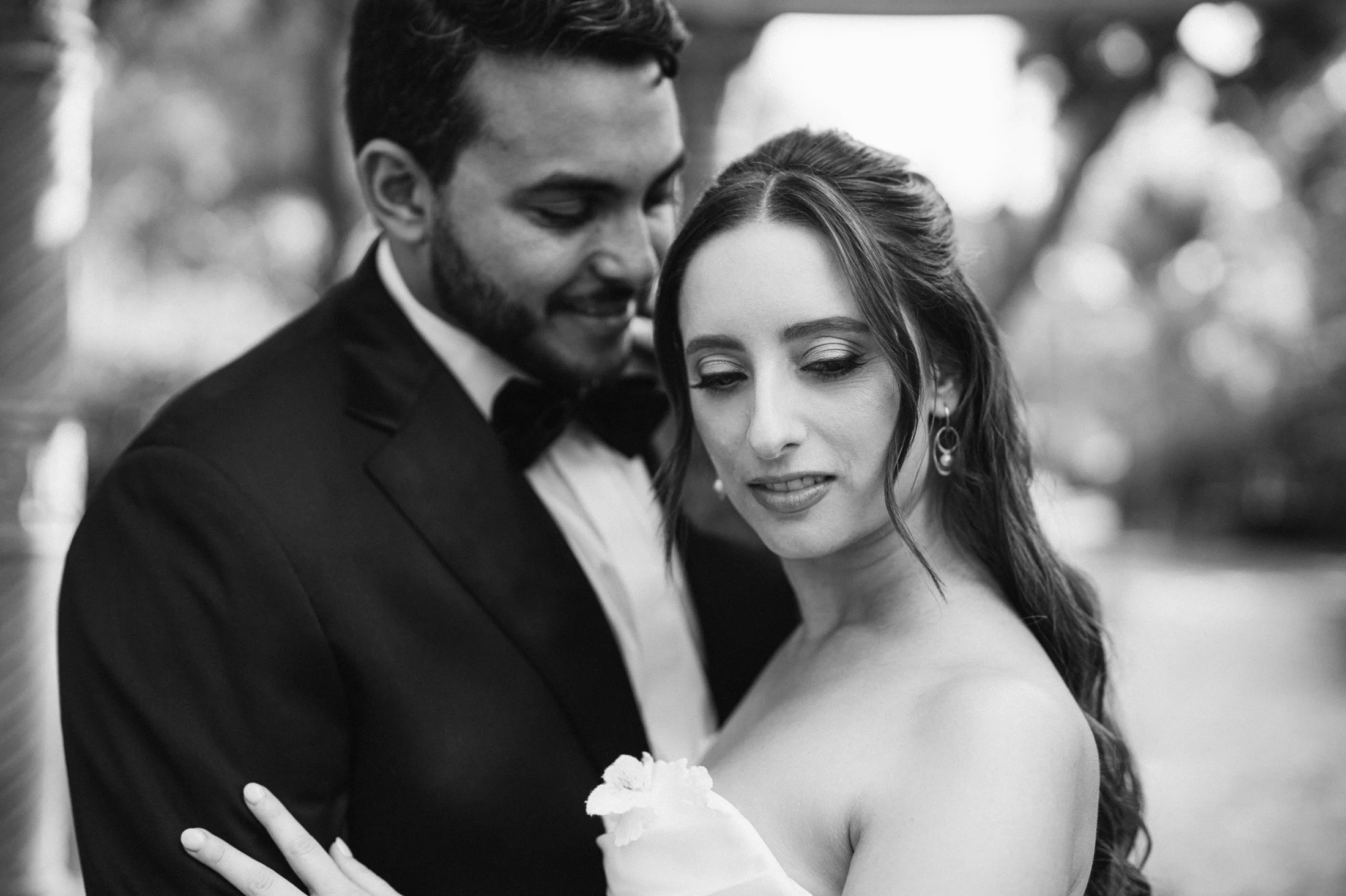 Black-and-white portrait of a bride and groom