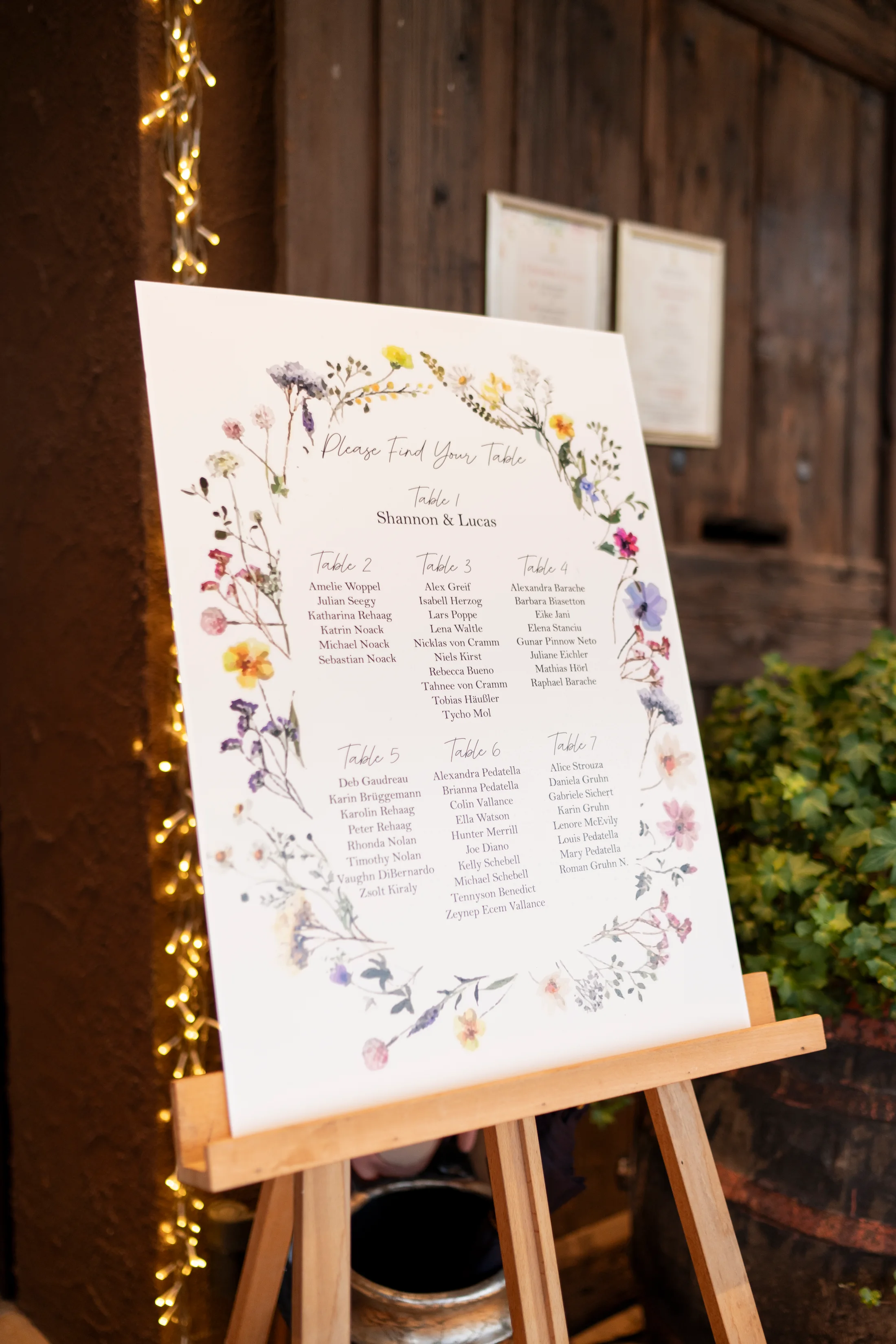Wedding seating plan decorated with flowers