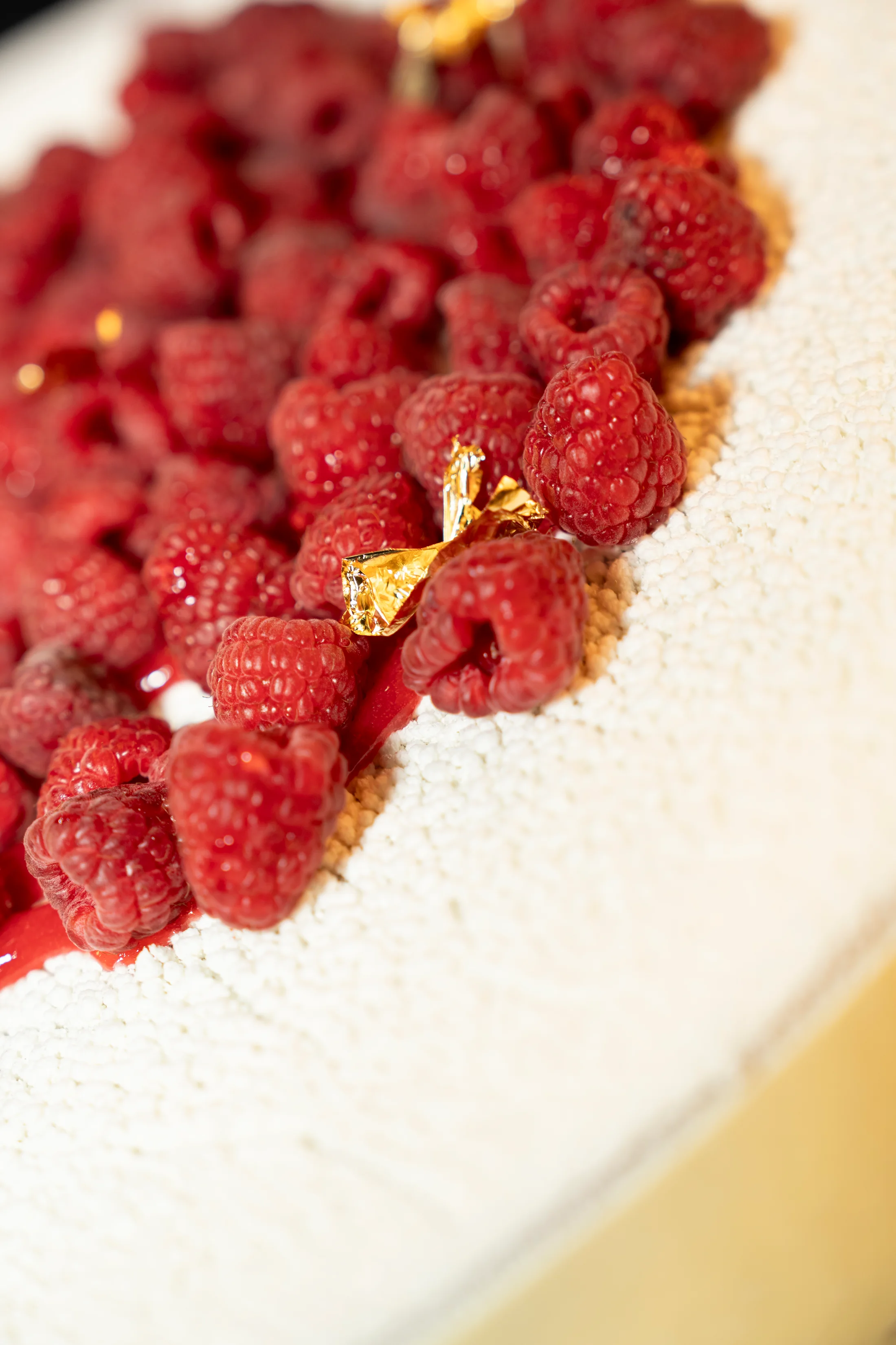 Wedding cake topped with red berries