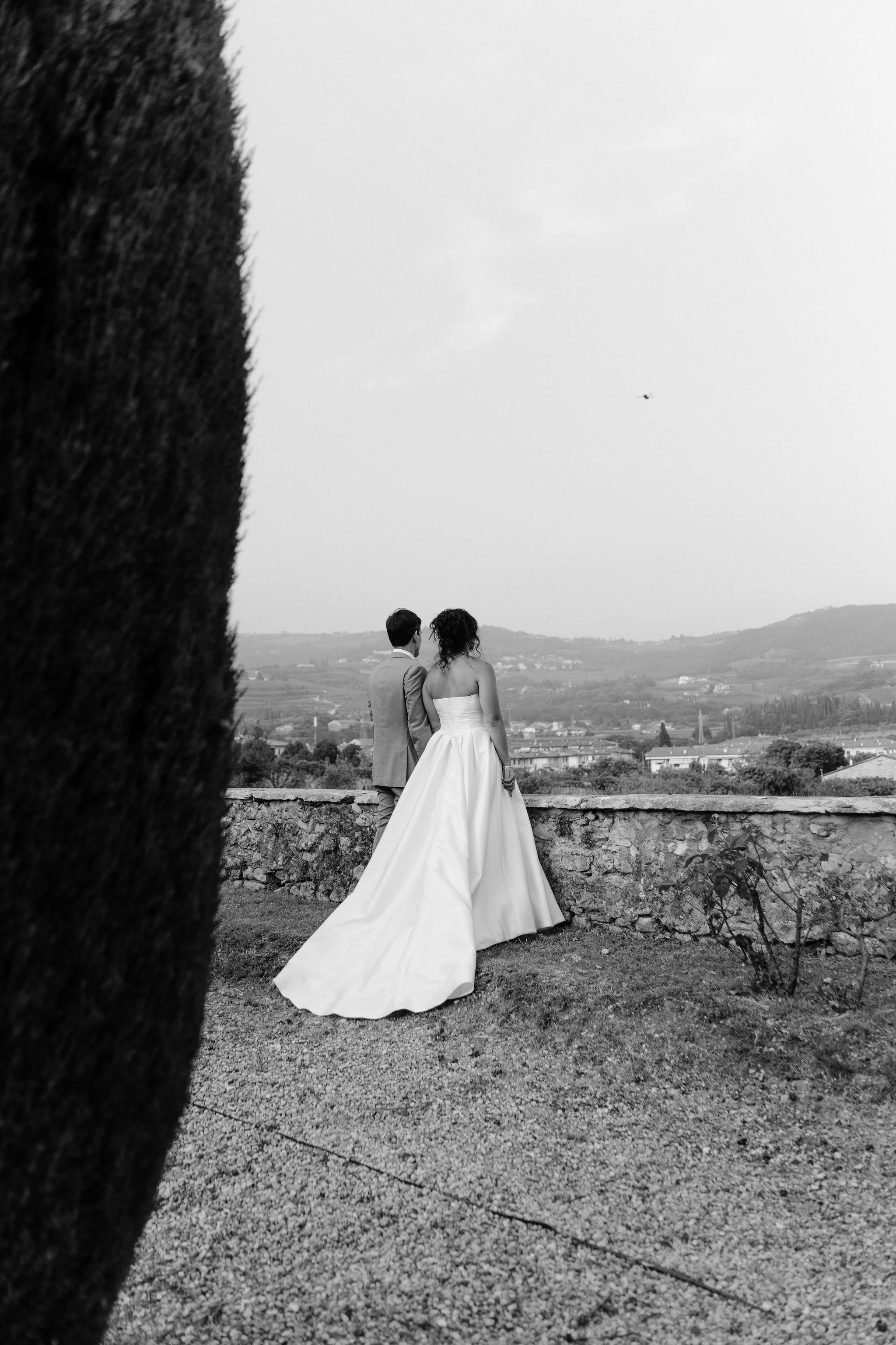 Black-and-white couple on a garden terrace