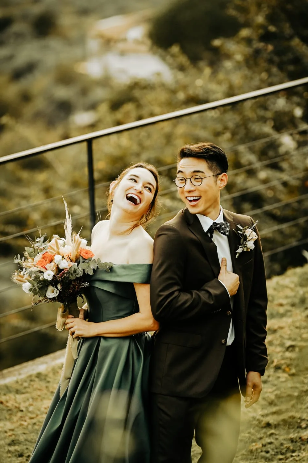 Couple with a bouquet in a garden