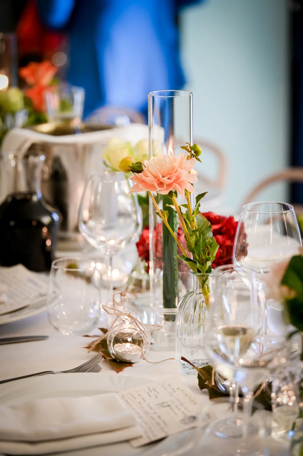 Candles and glassware on a reception table