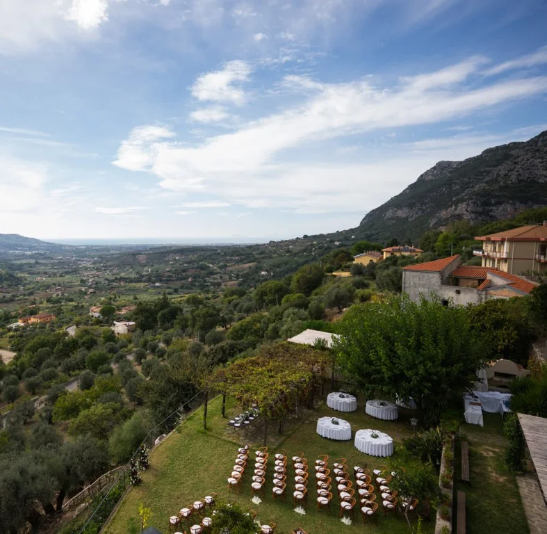 Wedding ceremony setting overlooking rolling countryside