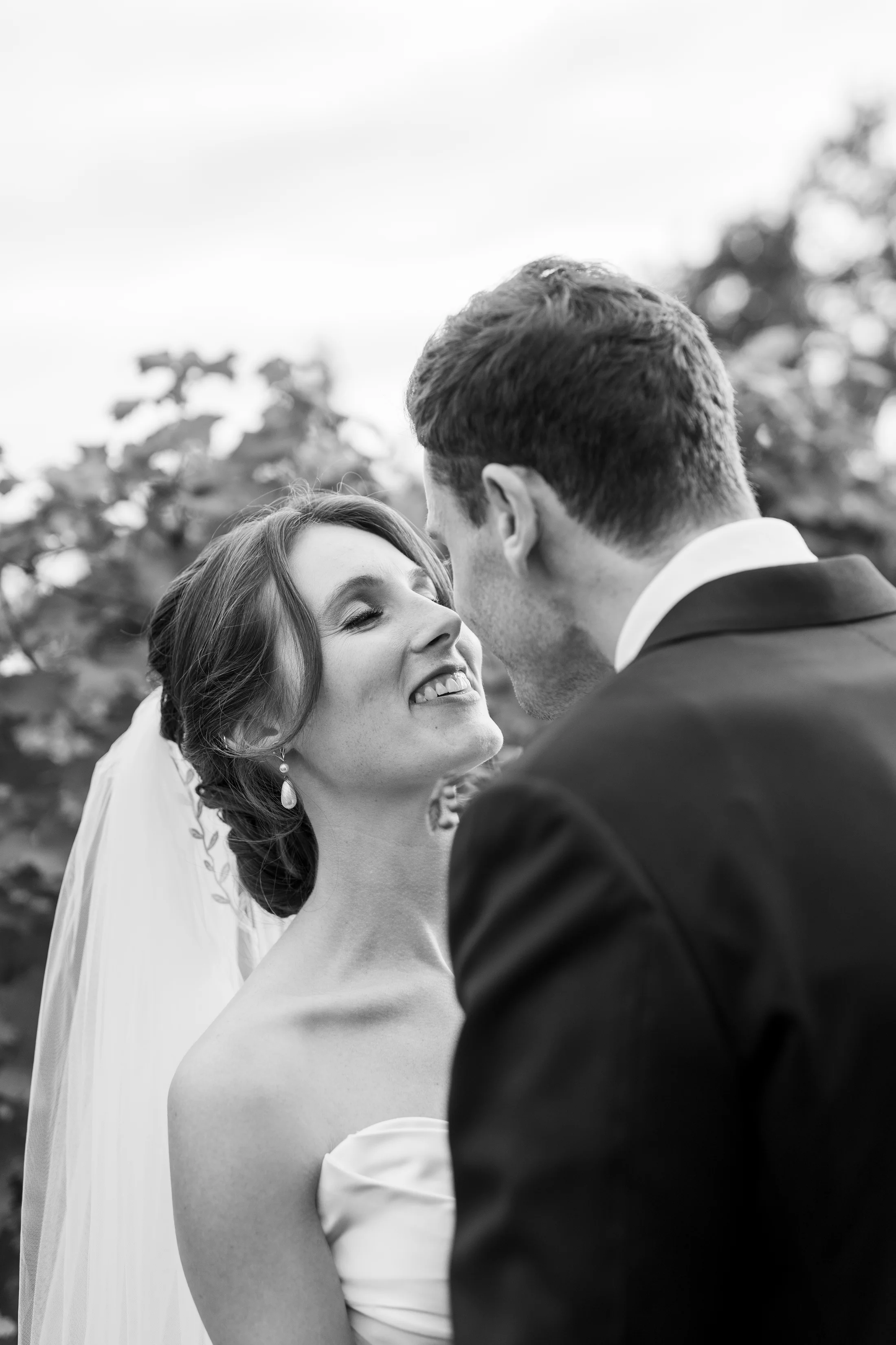 Black-and-white portrait of a bride and groom